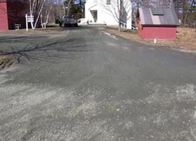 Gravel Lot with Potholes after Driveway Groomer™